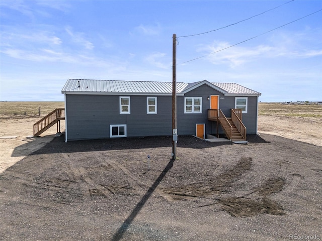 63560 Huckleberry Rd, Fowler, CO 81039 - view of front of property featuring metal roof and stairway