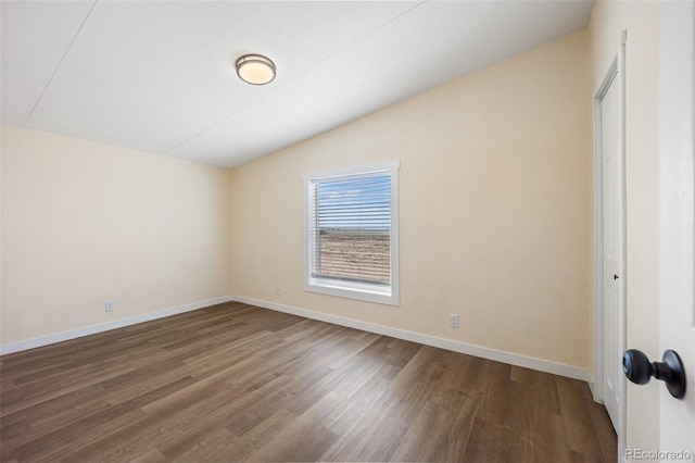 63560 Huckleberry Rd, Fowler, CO 81039 - unfurnished bedroom with vaulted ceiling, wood finished floors, and baseboards