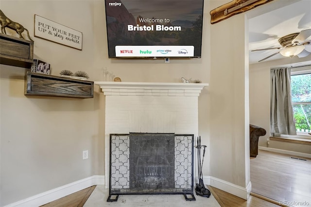 1510 S Cascade Ave, Colorado Springs, CO 80905 - detailed view of a fireplace, wood finished floors, and a ceiling fan