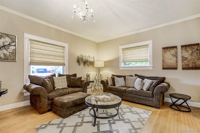 1510 S Cascade Ave, Colorado Springs, CO 80905 - living room featuring wood finished floors, healthy amount of natural light, ornamental molding, and a chandelier