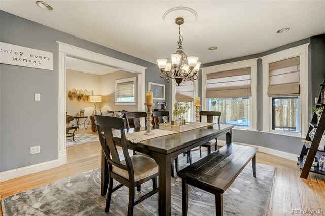 1510 S Cascade Ave, Colorado Springs, CO 80905 - dining room featuring a chandelier and light wood-type flooring