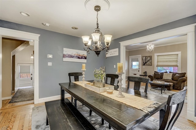 1510 S Cascade Ave, Colorado Springs, CO 80905 - dining area with a chandelier, crown molding, recessed lighting, and light wood-type flooring