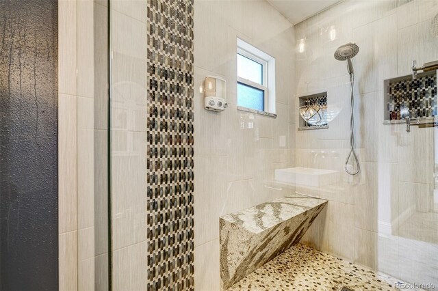 1510 S Cascade Ave, Colorado Springs, CO 80905 - bathroom featuring tiled shower and tile walls