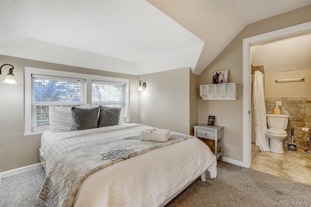 1510 S Cascade Ave, Colorado Springs, CO 80905 - carpeted bedroom featuring lofted ceiling and ensuite bath