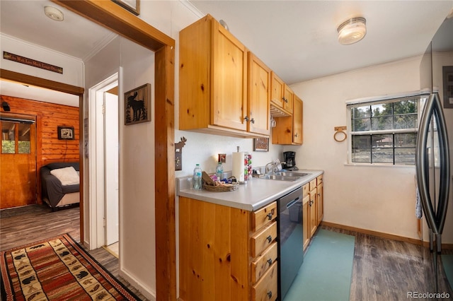 479 County Road 465, Grand Lake, CO 80447 - kitchen featuring stainless steel appliances, a sink, dark wood-style floors, crown molding, and light countertops
