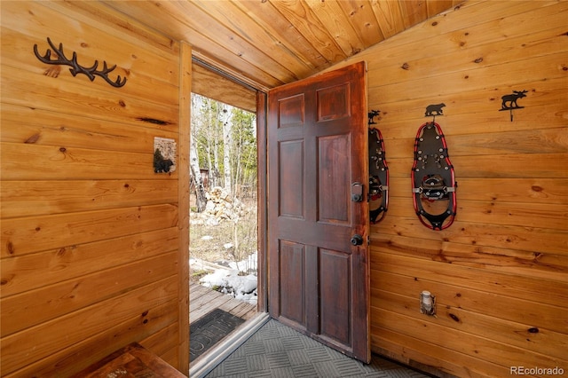 479 County Road 465, Grand Lake, CO 80447 - foyer featuring wood walls and vaulted ceiling
