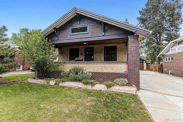 3145 W 31st Ave, Denver, CO 80211 - view of front of property with a porch and brick siding
