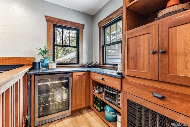 3145 W 31st Ave, Denver, CO 80211 - indoor dry bar with beverage cooler and light wood-type flooring