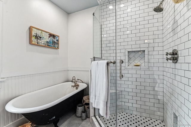 3145 W 31st Ave, Denver, CO 80211 - bathroom featuring a wainscoted wall, a shower stall, a freestanding tub, and a decorative wall