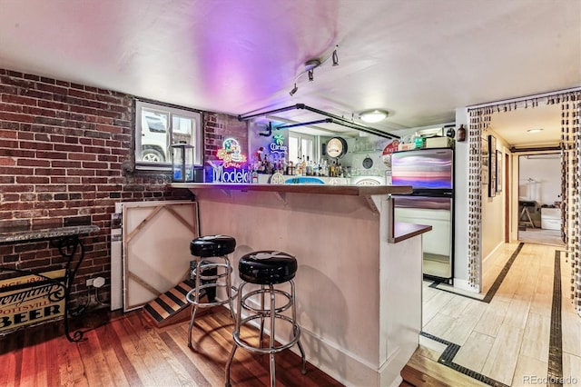 3145 W 31st Ave, Denver, CO 80211 - indoor bar featuring wood-type flooring and brick wall