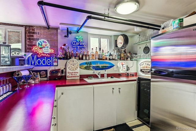 3145 W 31st Ave, Denver, CO 80211 - indoor wet bar featuring freestanding refrigerator