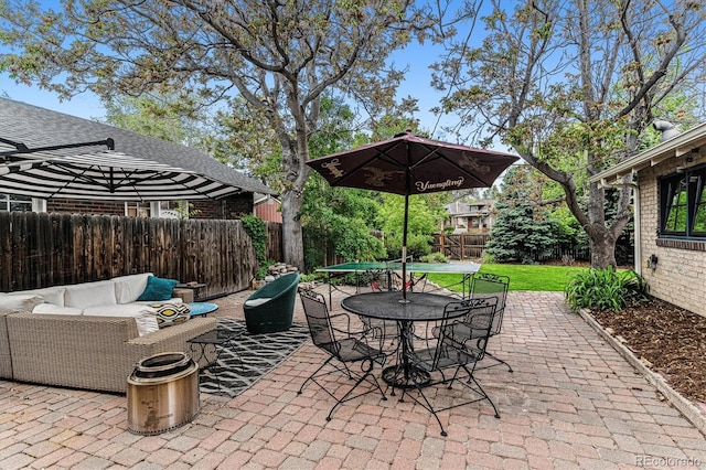 3145 W 31st Ave, Denver, CO 80211 - fenced backyard with an outdoor hangout area, outdoor dining area, and a patio