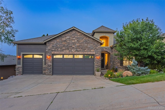 view of front of property featuring a garage