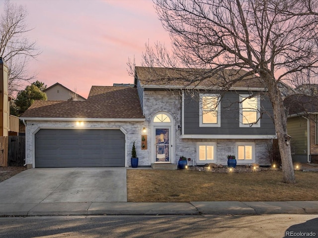 view of front of property featuring a garage