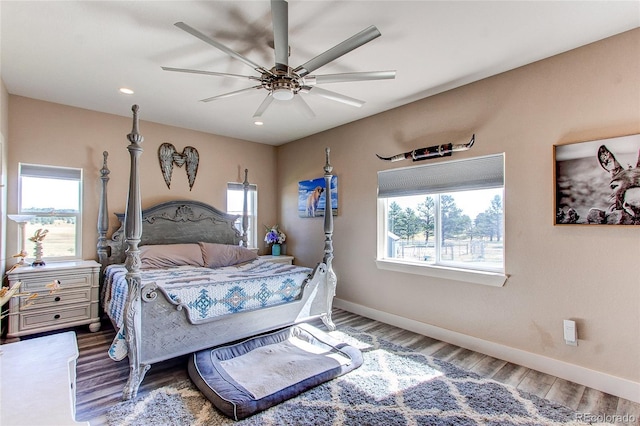 bedroom featuring ceiling fan and hardwood / wood-style floors