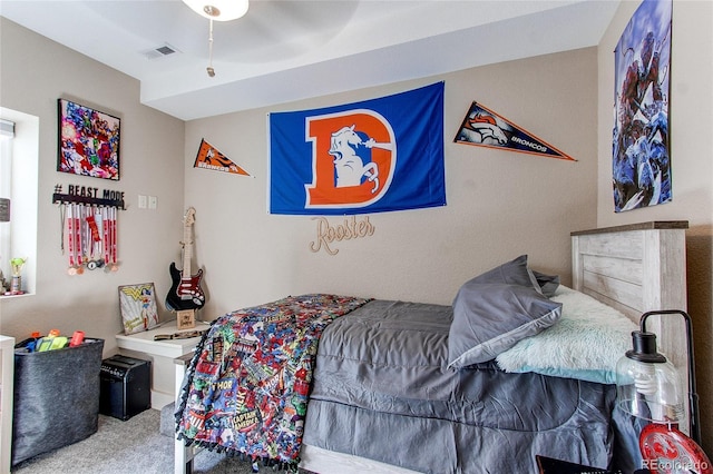 carpeted bedroom with ceiling fan