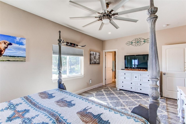 18050 Wedemeyer Rd, Kiowa, CO 80117 - bedroom with wood finished floors, baseboards, and a ceiling fan