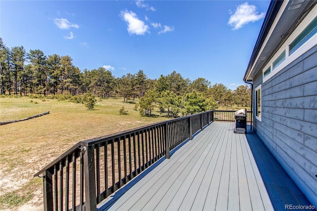 18050 Wedemeyer Rd, Kiowa, CO 80117 - wooden terrace with area for grilling, a lawn, and view of scattered trees