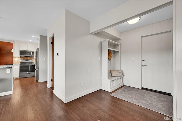 30334 Roan Dr, Evergreen, CO 80439 - mudroom with dark wood-style floors and recessed lighting