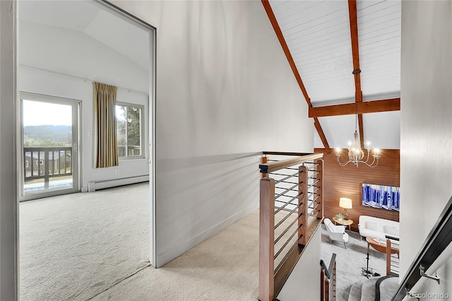 30334 Roan Dr, Evergreen, CO 80439 - stairway featuring carpet floors, baseboard heating, and a chandelier