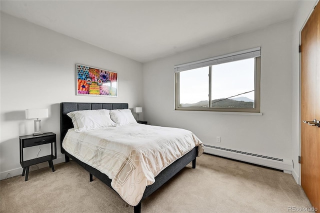 30334 Roan Dr, Evergreen, CO 80439 - bedroom featuring a baseboard radiator and light carpet