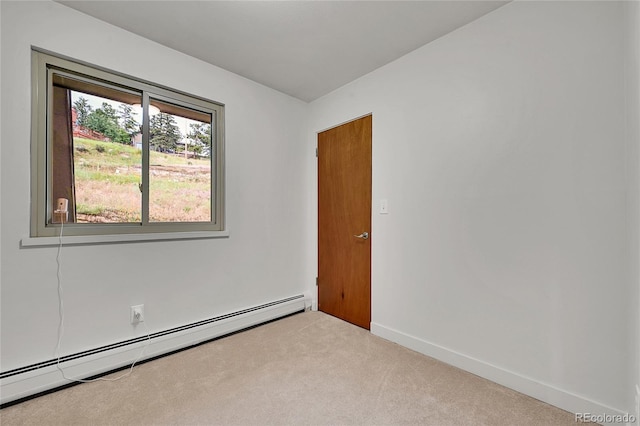 30334 Roan Dr, Evergreen, CO 80439 - unfurnished room with a baseboard radiator and carpet floors