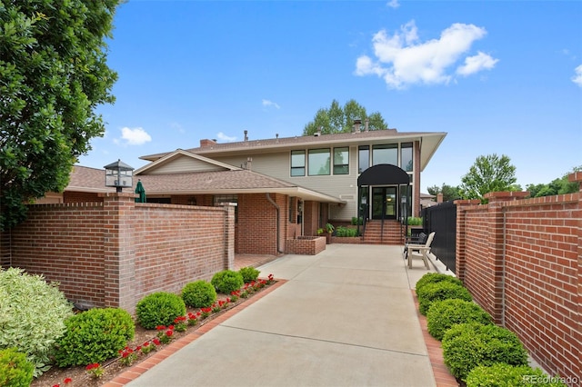 2800 S University Blvd Unit 174, Denver, CO 80210 - view of front facade featuring brick siding