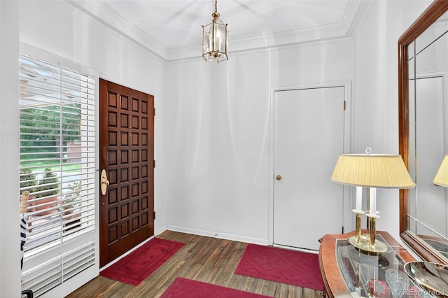 2800 S University Blvd Unit 174, Denver, CO 80210 - foyer entrance featuring ornamental molding, dark wood-style flooring, and a chandelier