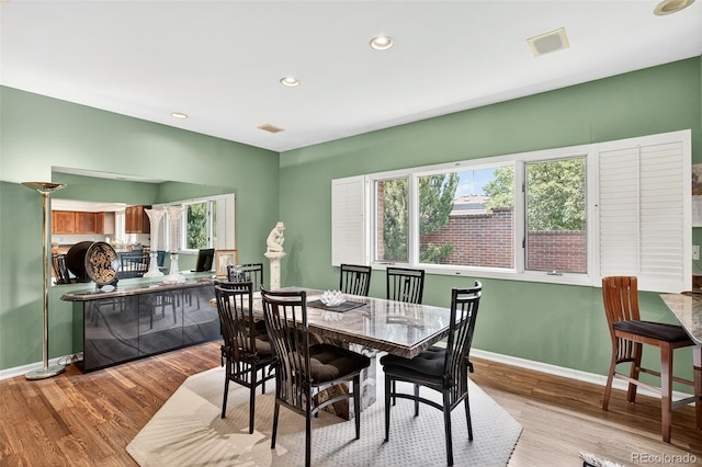 2800 S University Blvd Unit 174, Denver, CO 80210 - dining room with light wood-type flooring and recessed lighting