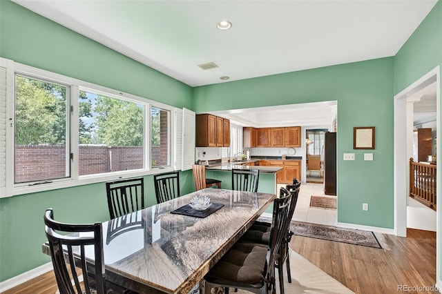 2800 S University Blvd Unit 174, Denver, CO 80210 - dining area featuring plenty of natural light, light wood-style floors, and recessed lighting