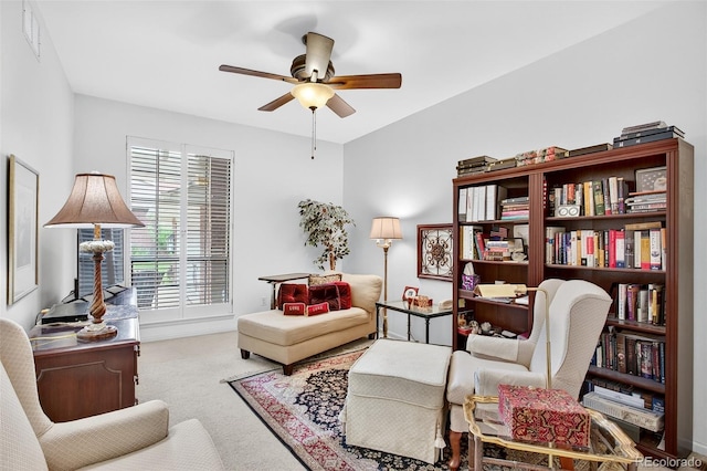 2800 S University Blvd Unit 174, Denver, CO 80210 - carpeted living room featuring a ceiling fan