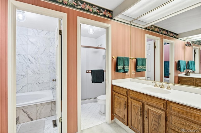 2800 S University Blvd Unit 174, Denver, CO 80210 - bathroom with an enclosed shower, vanity, a tub with marble appearance, and tile patterned flooring