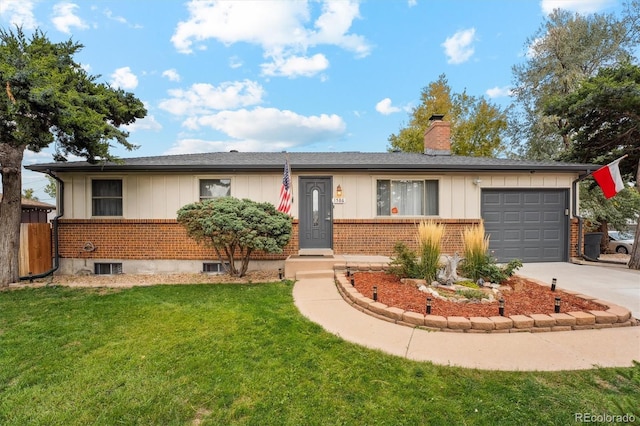 ranch-style home with a garage and a front lawn