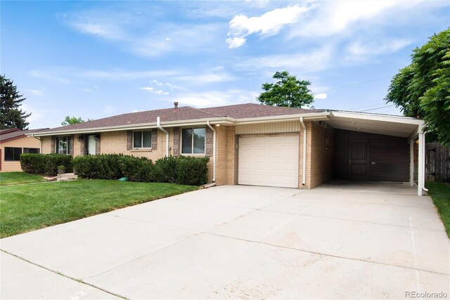 6666 S Pennsylvania St, Centennial, CO 80121 - ranch-style house with driveway, brick siding, an attached garage, a front lawn, and an attached carport