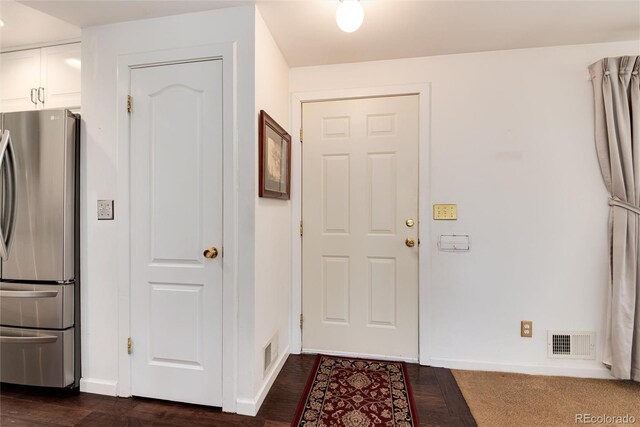 6666 S Pennsylvania St, Centennial, CO 80121 - foyer with baseboards and dark wood-type flooring