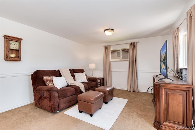 6666 S Pennsylvania St, Centennial, CO 80121 - living room featuring light carpet and baseboards
