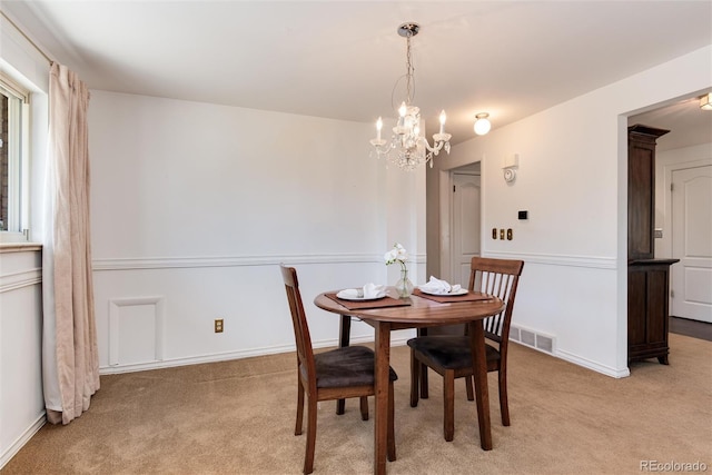 6666 S Pennsylvania St, Centennial, CO 80121 - dining room featuring light colored carpet and a chandelier