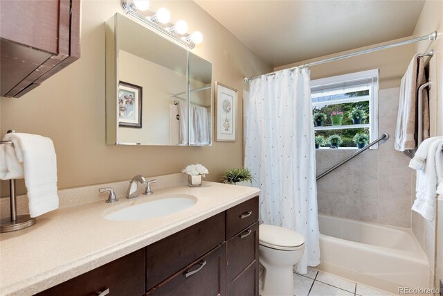 6666 S Pennsylvania St, Centennial, CO 80121 - bathroom with vanity, tile patterned flooring, and shower / bathtub combination with curtain
