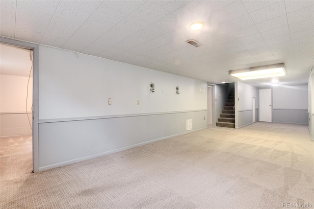 6666 S Pennsylvania St, Centennial, CO 80121 - carpeted spare room with stairway and baseboards