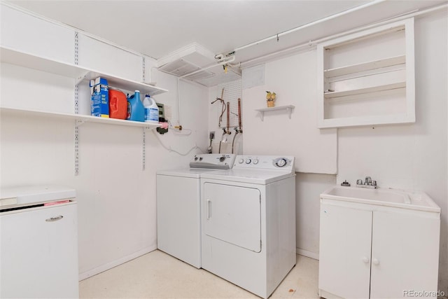 6666 S Pennsylvania St, Centennial, CO 80121 - laundry area featuring washing machine and dryer