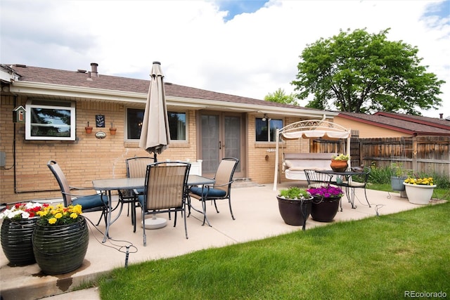 6666 S Pennsylvania St, Centennial, CO 80121 - view of patio featuring french doors and outdoor dining area