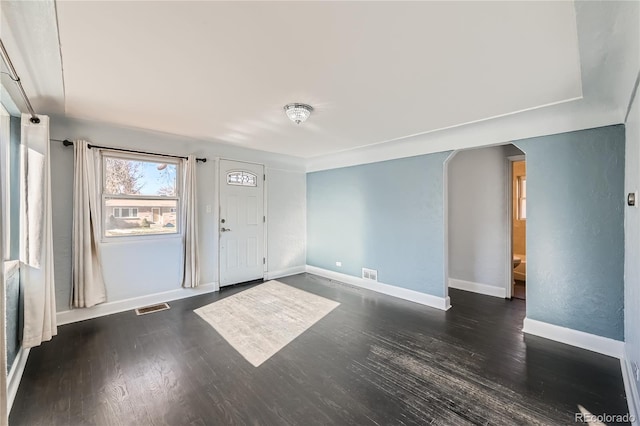 empty room featuring dark hardwood / wood-style floors