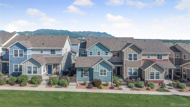 44 S Olympian Dr, Colorado Springs, CO 80905 - view of front of property featuring board and batten siding, a mountain view, and a residential view