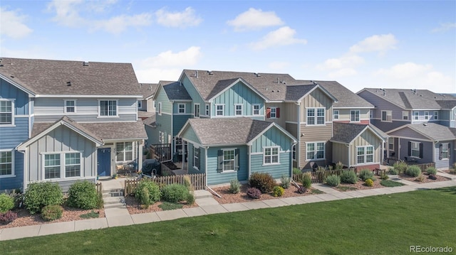 44 S Olympian Dr, Colorado Springs, CO 80905 - multi unit property featuring board and batten siding, a residential view, and a shingled roof