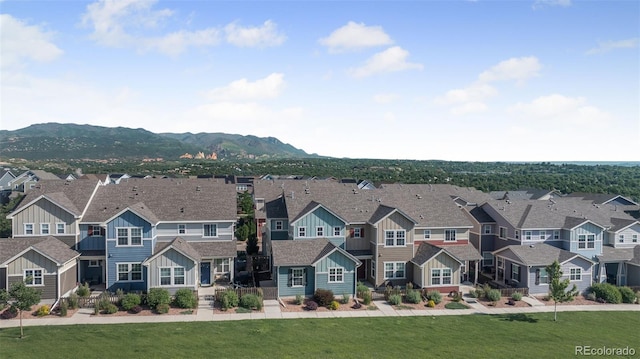 44 S Olympian Dr, Colorado Springs, CO 80905 - multi unit property featuring board and batten siding, a residential view, and a mountain view