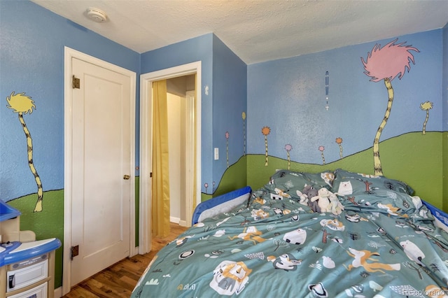 1917 E Cache La Poudre St, Colorado Springs, CO 80909 - bedroom with wood finished floors