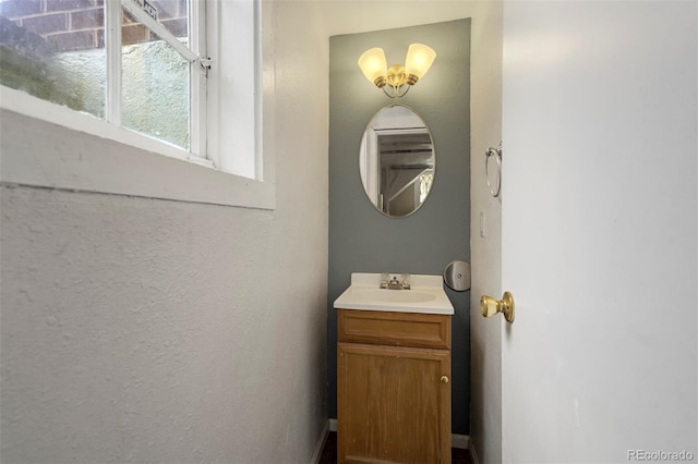 1917 E Cache La Poudre St, Colorado Springs, CO 80909 - bathroom with vanity and baseboards