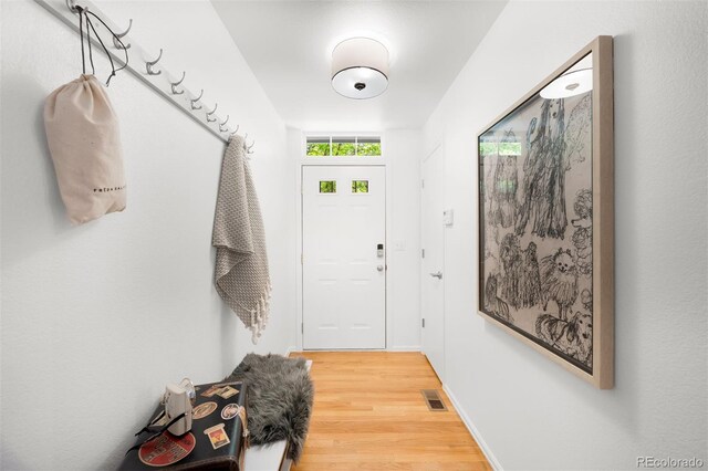 1947 King St, Denver, CO 80204 - doorway featuring wood finished floors
