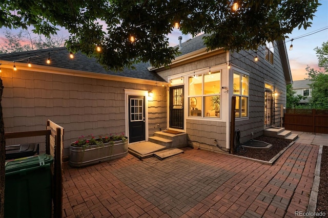 1947 King St, Denver, CO 80204 - back of property with a patio and roof with shingles