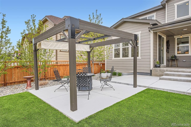 view of patio featuring a pergola